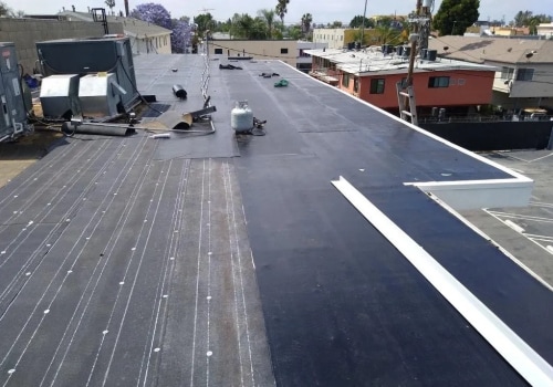 The Pros and Cons of Having a Flat Roof: An Expert's Perspective